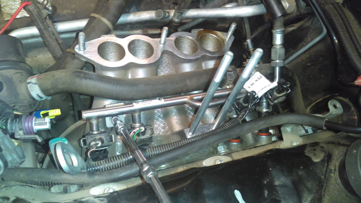 Замена прокладки коллекторов Шеви-Нивы